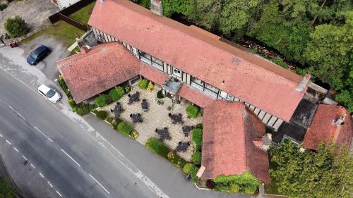 an overhead view of an old brick building with a yard at The Ribchester Arms in Blackburn