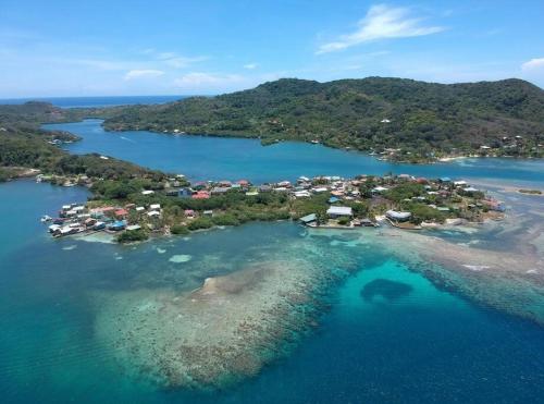 an aerial view of a small island in the water at Ocean Breeze Villa Rentals in Oak Ridge