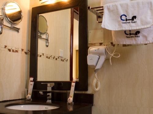 Et badeværelse på Caravan Hotel
