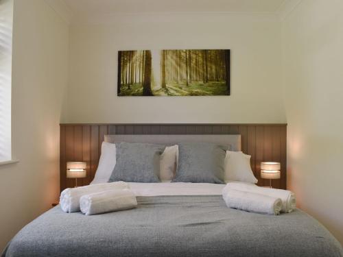 Posteľ alebo postele v izbe v ubytovaní Woodpeckers