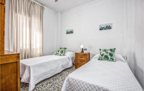 Voodi või voodid majutusasutuse Gorgeous Home In Mlaga With Wifi toas