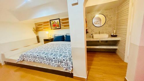 Postel nebo postele na pokoji v ubytování บ้านมัจฉา