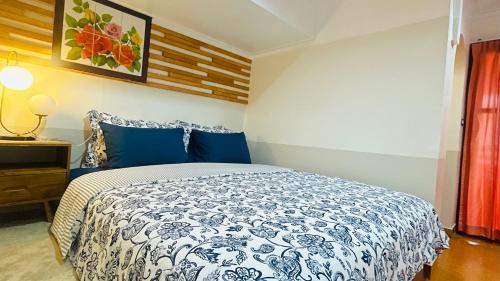 Postel nebo postele na pokoji v ubytování บ้านมัจฉา
