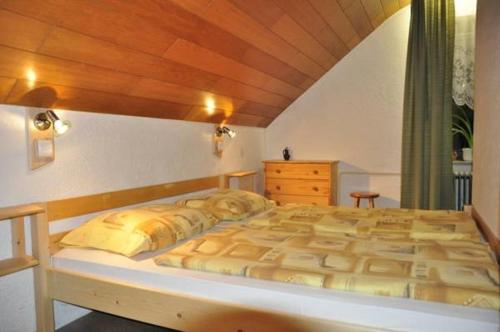 A bed or beds in a room at Apartment Milena