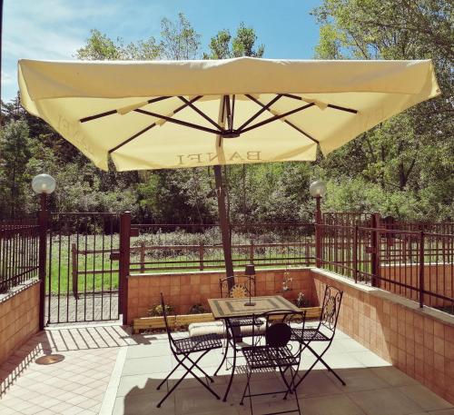 A patio or other outdoor area at La Casa di Golia