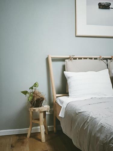 Postel nebo postele na pokoji v ubytování #outofboxproject tiny-home and garden house