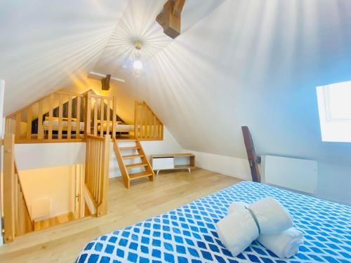 Poschodová posteľ alebo postele v izbe v ubytovaní Maison Le Clos d'Ardon