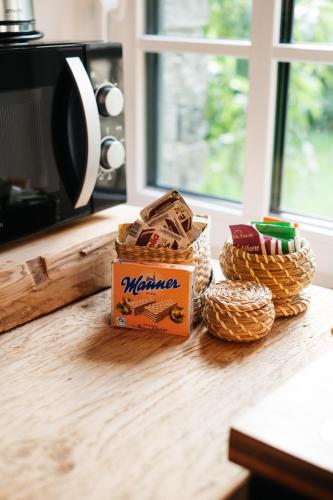 a box of matches and baskets on a counter at Chalet am Sonnenhang in Obertraun