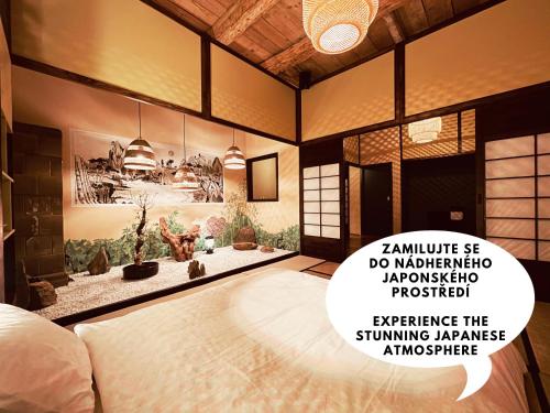 Dormitorio con cama con dosel en la pared en OROOM Japan - Role Play For Couples in BRNO en Brno