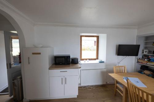 Dapur atau dapur kecil di Dolphin View Hillockhead