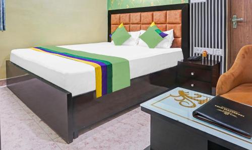 Hotel Prem Residencyにあるベッド