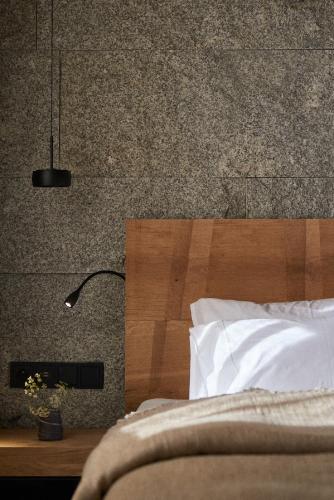 Ένα ή περισσότερα κρεβάτια σε δωμάτιο στο EnHotel