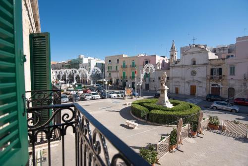 a view of a city street from a balcony at VICOLO MURO in Molfetta