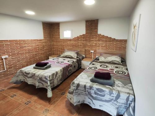 Кровать или кровати в номере San Julian Estarondo