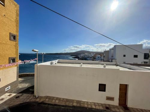 a view of the ocean from the roof of a building at Eras Views in Las Eras