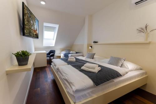 Postel nebo postele na pokoji v ubytování Pension Chmelnice
