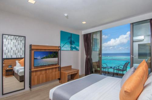 Cama o camas de una habitación en Triton Prestige Seaview and Spa