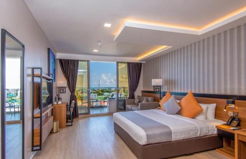 Cama o camas de una habitación en Triton Prestige Seaview and Spa