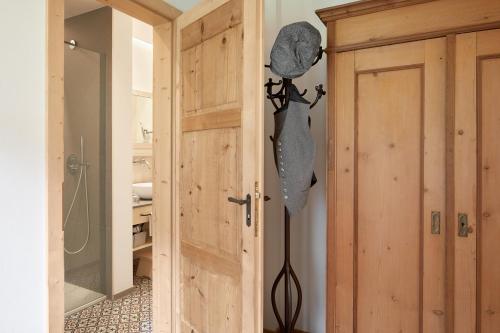 a door leading to a room with a closet at Hotel Bella Vista in Trafoi