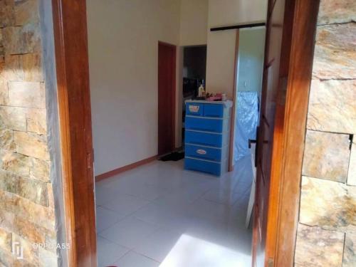 a room with a blue dresser and a blue cabinet at Shared Room/ Dormitory Bed in Romblon Romblon in Romblon