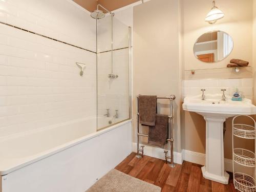 a bathroom with a shower and a sink at Forth Reflections in Queensferry