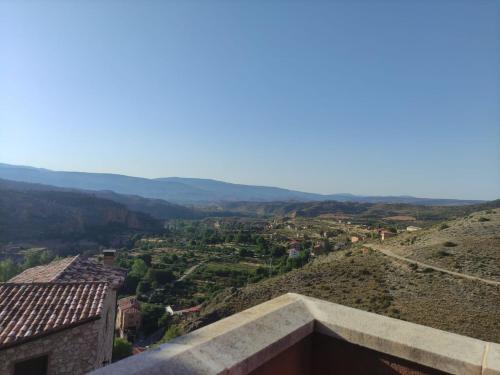 a view from the top of a mountain with a city at Casa Rural La Torreta en El Rincón de Ademuz in Castielfabib