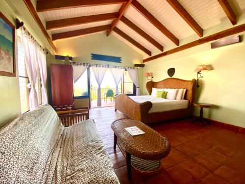 Katil atau katil-katil dalam bilik di Tranquility Beach Suites