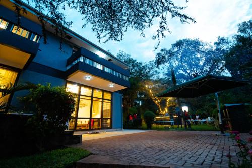 Ein Garten an der Unterkunft Pangolin Nest Boutique Hotel
