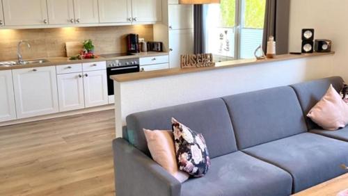 Køkken eller tekøkken på Dünenhaus Ferienwohnung De Düün Dree