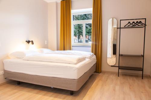Postel nebo postele na pokoji v ubytování Gitstapper Hof