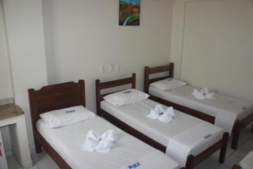 Postel nebo postele na pokoji v ubytování Hotel Rey
