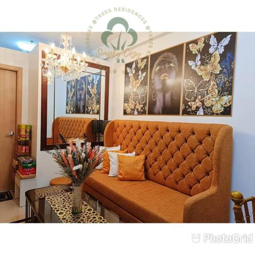 Ruang duduk di Simply COZY at Trees Residences 2 Bedroom Unit