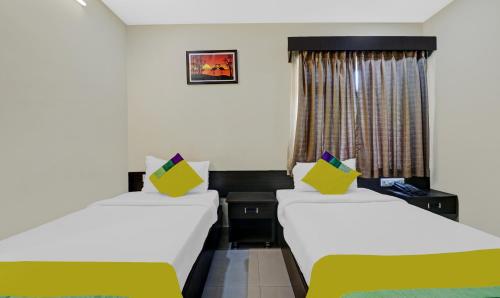 Postel nebo postele na pokoji v ubytování Hotel MVP Check Inn