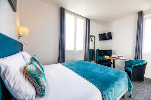 Letto o letti in una camera di La Villa Andry