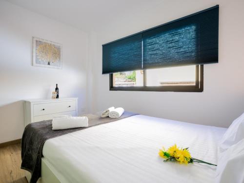 Ένα ή περισσότερα κρεβάτια σε δωμάτιο στο 1d Tamaimo Apartment