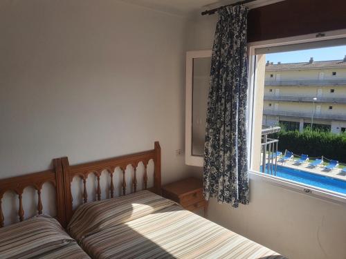 Posteľ alebo postele v izbe v ubytovaní Payet Apartments