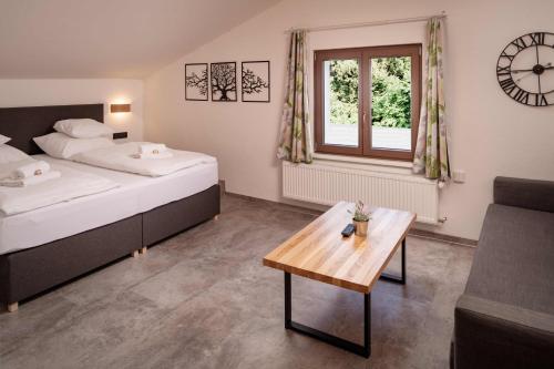 Postel nebo postele na pokoji v ubytování Wellness aparthotel Martiňák