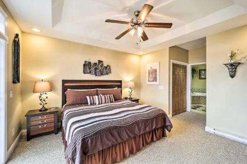 a bedroom with a bed and a ceiling fan at Scenic Views! Ski-In/Ski-Out Condo in Beech Mtn in Beech Mountain