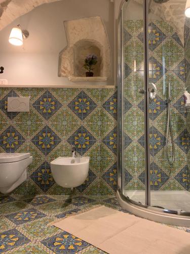 a bathroom with a shower and a sink at Stella in Terlizzi