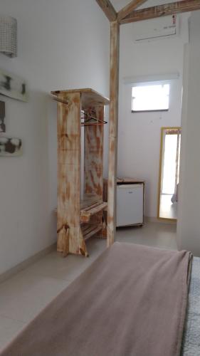 Ein Bett oder Betten in einem Zimmer der Unterkunft Aloha Itaúna