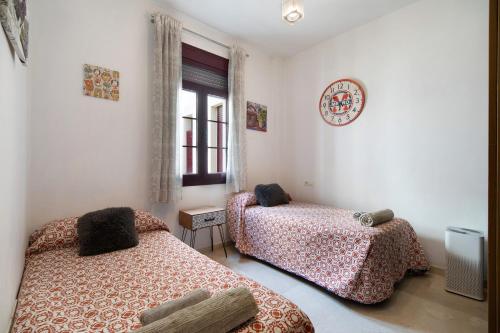 Katil atau katil-katil dalam bilik di Dúplex en el centro de Jerez