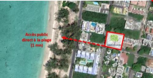 an aerial view of a beach with a red rectangle at LUXURY MODERN apartment - Excellent location 50m from the beach, restaurants, bars, shops in Flic-en-Flac