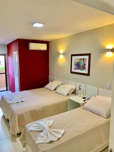 Ένα ή περισσότερα κρεβάτια σε δωμάτιο στο Murano Center Hotel