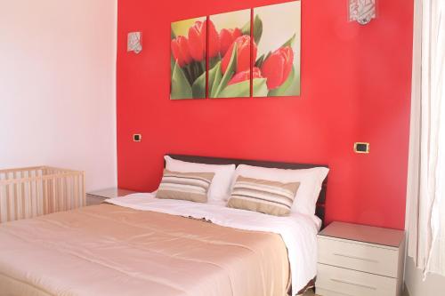 Postel nebo postele na pokoji v ubytování B&B Vesuvio Smiling