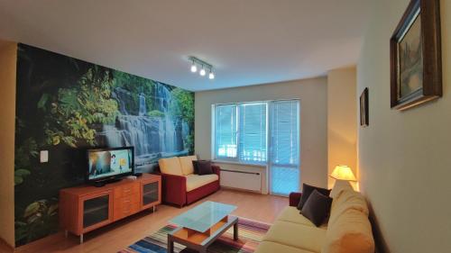 Un televizor și/sau centru de divertisment la Two Bedroom Apartment in EAGLE ROCK Mountain Resort
