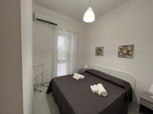Posteľ alebo postele v izbe v ubytovaní Casa Maira