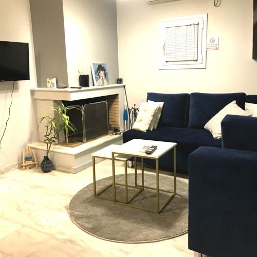 Ruang duduk di Beautiful maisonette with a view to the mountains and the sea