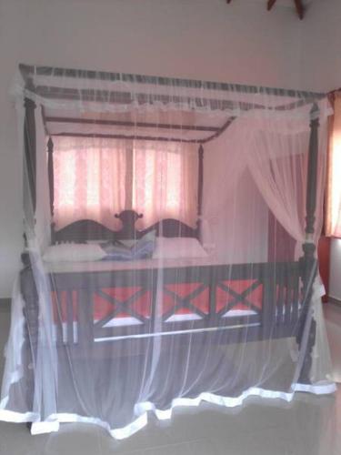 Postel nebo postele na pokoji v ubytování Villa Jungle Paradise