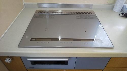 a stove top oven sitting on top of a counter at Guest House Nishimura - Vacation STAY 13438 in Kyoto