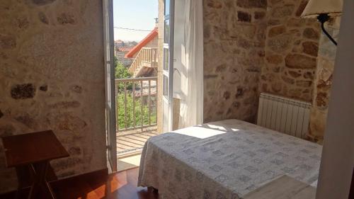 Postel nebo postele na pokoji v ubytování Casa grande cerca de la playa